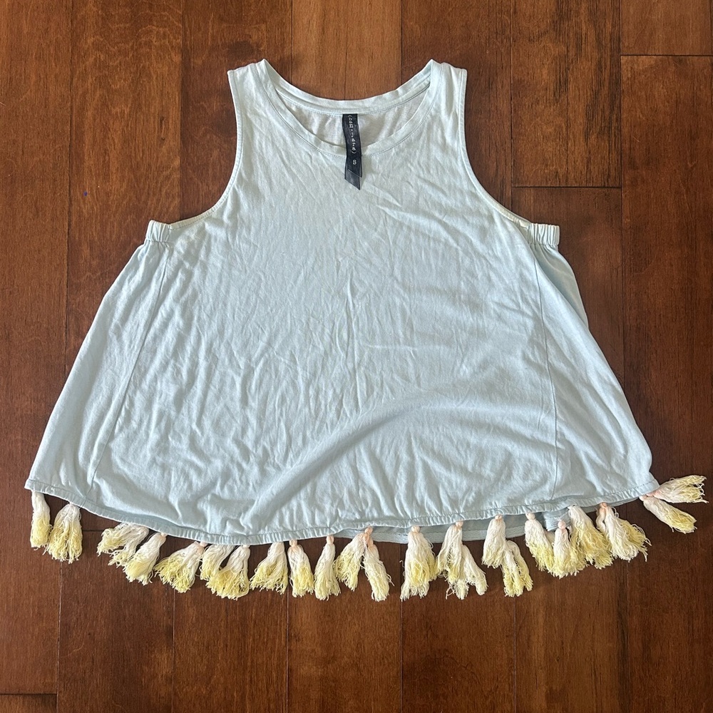 Elegant Sleeveless Top with Tassel Hem - Cream